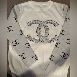 Chic White Sweater with Black Accents